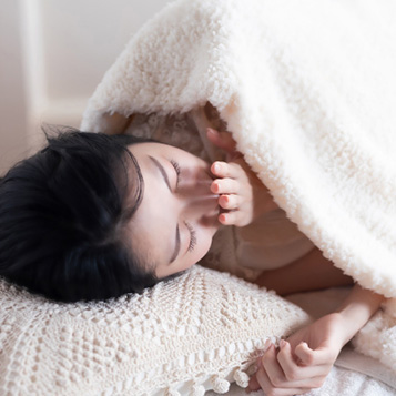 スピリチュアルな理由から眠気が引き起こされているイメージ